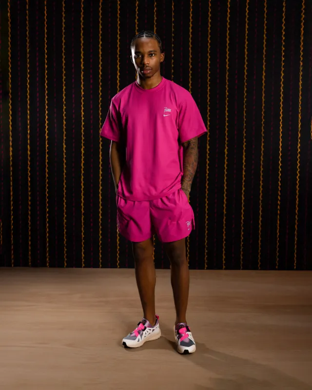 Nike x Patta Running Team T-shirt (Fireberry) sold by Patta
