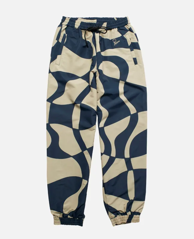 byParra Zoom Winds Track Pants (Navy Blue) sold by Patta