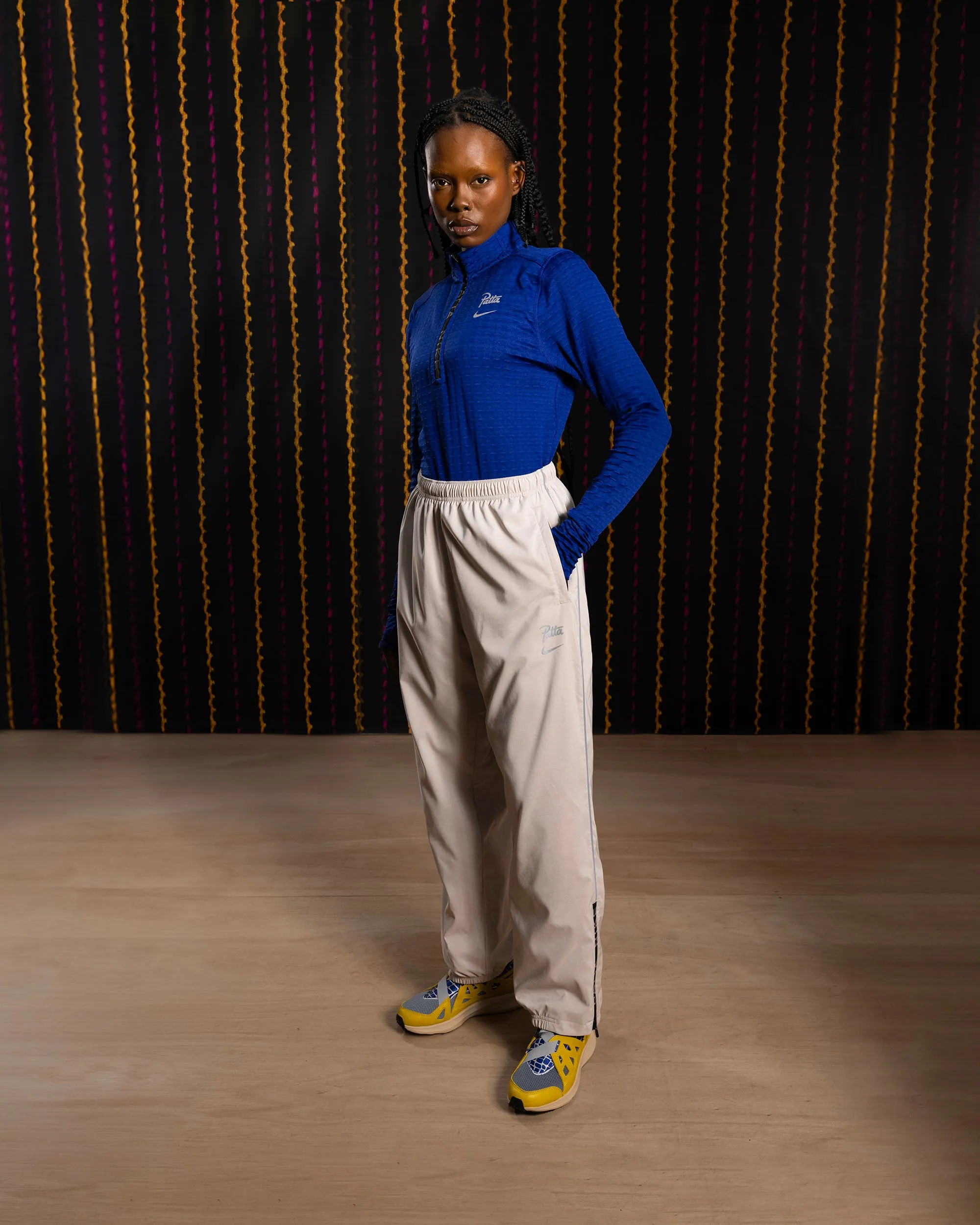 Nike x Patta Running Team Track Pants (Sanddrift/Cream II) sold by Patta