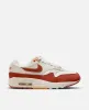 Nike WMNS Nike Air Max 1 LX (Saill/Rugged Orange-LT Orewood BRN) sold by Patta