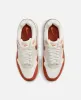 Nike WMNS Nike Air Max 1 LX (Saill/Rugged Orange-LT Orewood BRN) sold by Patta
