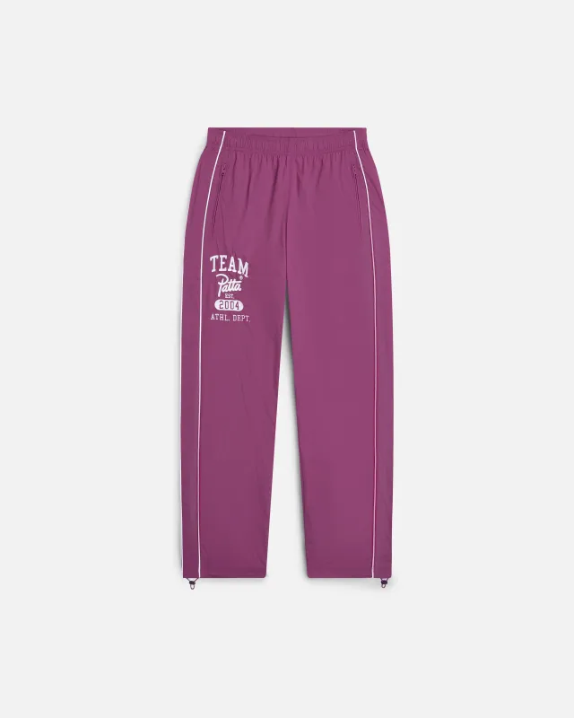 Patta Athletic Nylon Track Pants (Boysenberry) sold by Patta