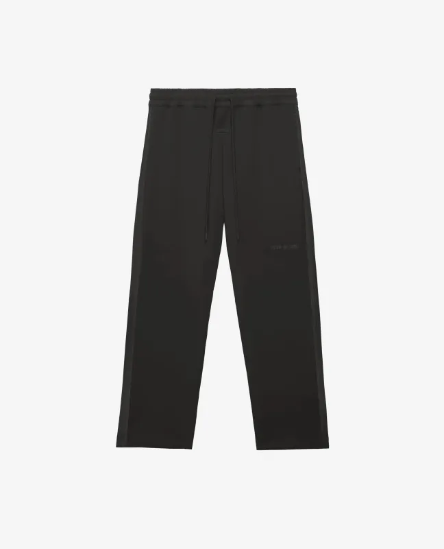 adidas Fear Of God Athletics Tearaway Pant (Black) sold by Patta