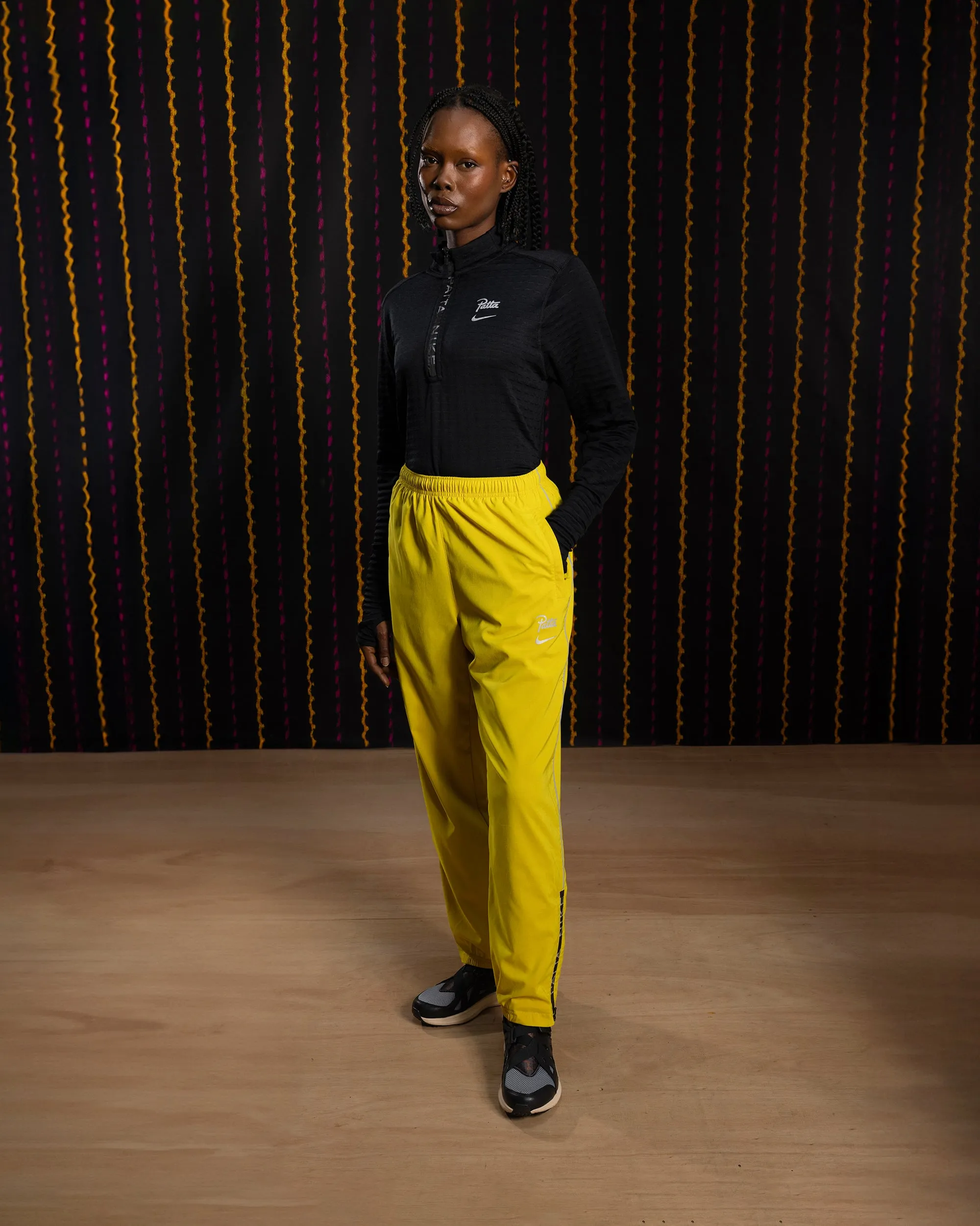 Nike x Patta Running Team Track Pants (Saffron Quartz) sold by Patta