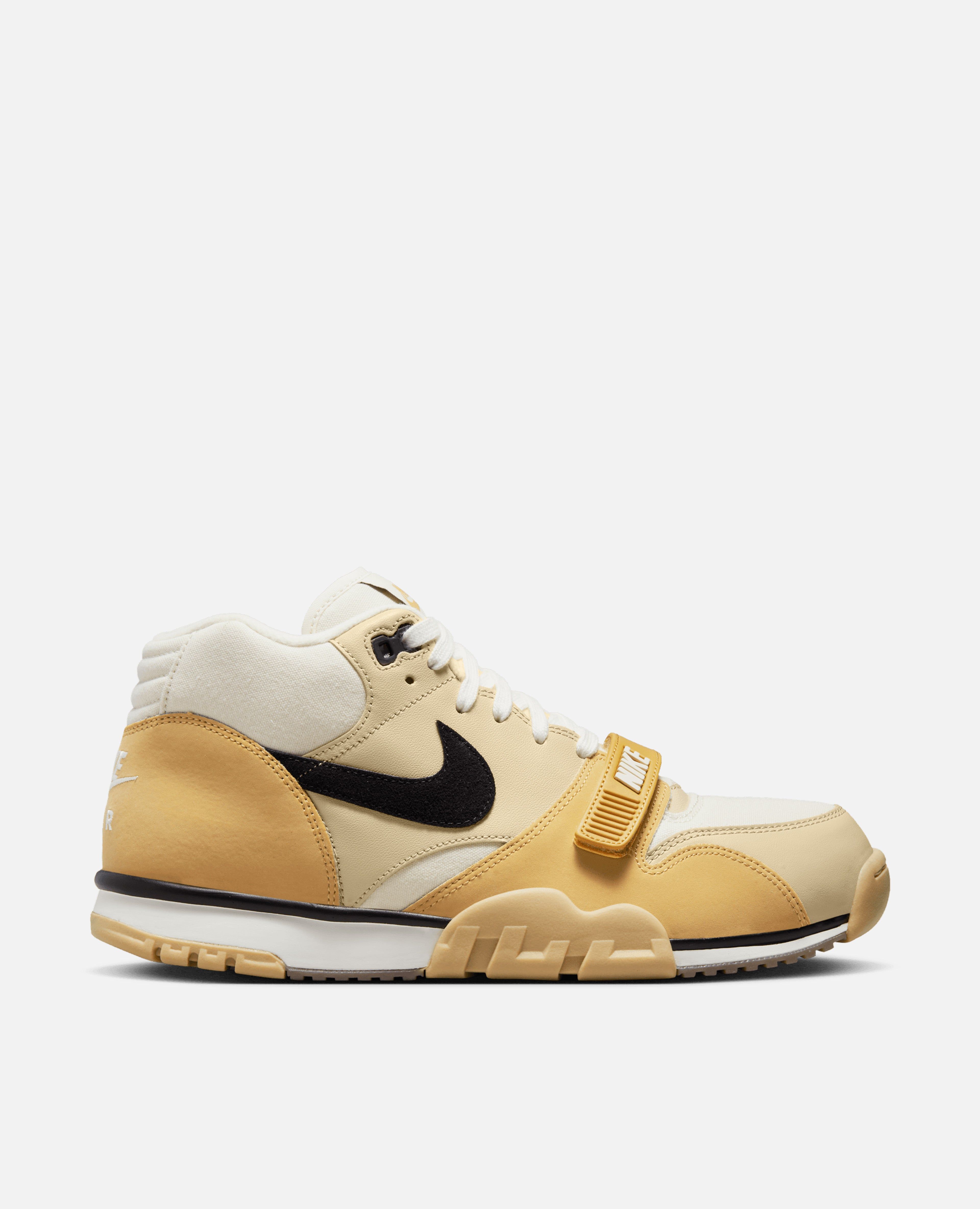 Nike Air Trainer 1 (Coconut Milk/Black-Team Gold-Sail) sold by Patta