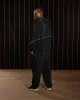 Nike x Patta Running Team Hooded Track Jacket (Black) sold by Patta