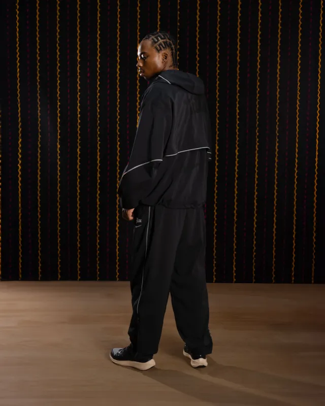 Nike x Patta Running Team Hooded Track Jacket (Black) sold by Patta