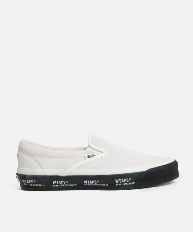 Vans x WTAPS UA OG Classic Slip-On LX (GPS/White/Black) sold by Patta