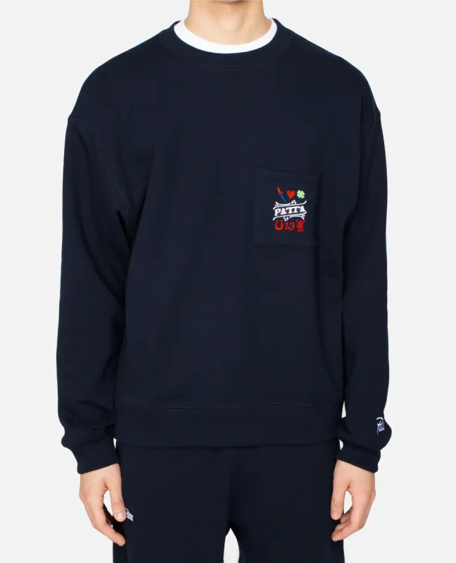 Patta Lucky Charm Pocket Crewneck Sweater (Sky Captain) sold by Patta