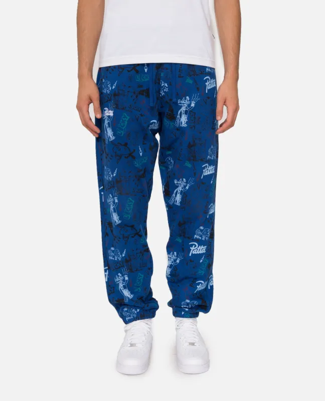 Patta Father & Son Jogging Pants (Sodalite Blue/Multi) sold by Patta