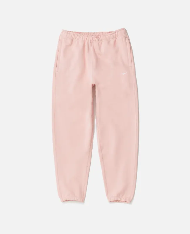 Nike NRG Solo Swoosh Fleece Pants (Bleached Coral/White) sold by Patta