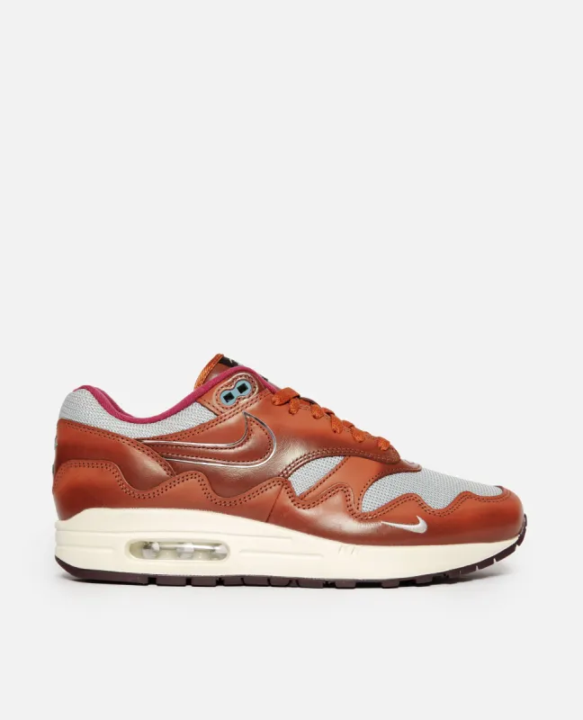 Patta x Nike Air Max 1 (Dark Russet/Dark Russet-Metallic Silver) sold by Patta