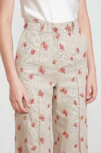 Pantalon en lin brodé de motifs fleuris sold by Paul & Joe