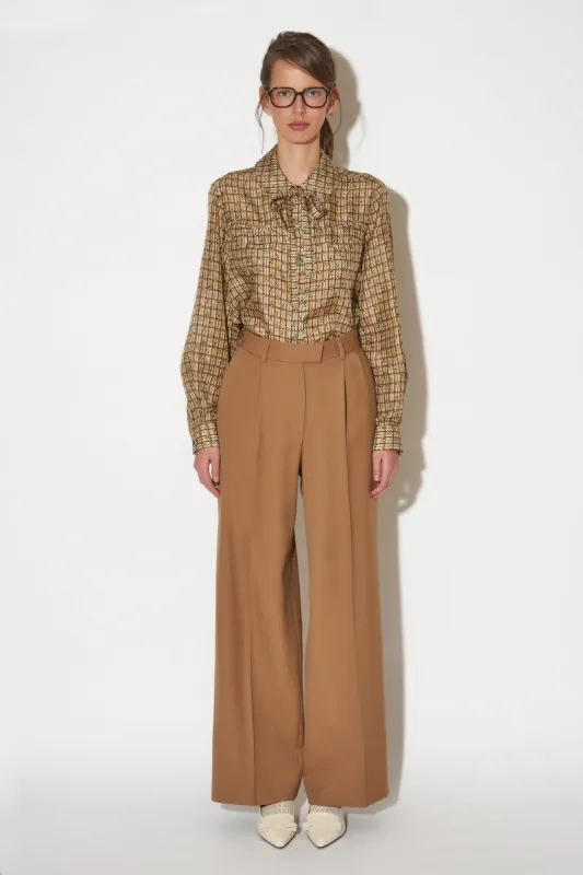 Pantalon en gabardine de laine vierge sold by Paul & Joe