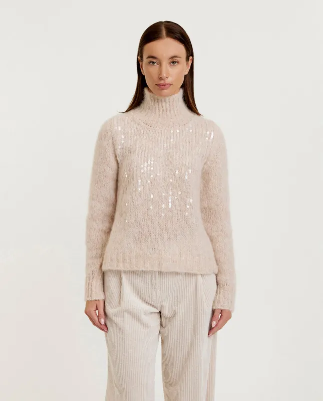 Gebreide coltrui sold by Pauw Amsterdam