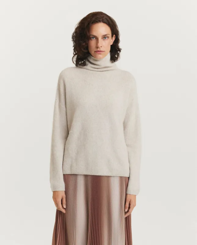 Wollen coltrui sold by Pauw Amsterdam