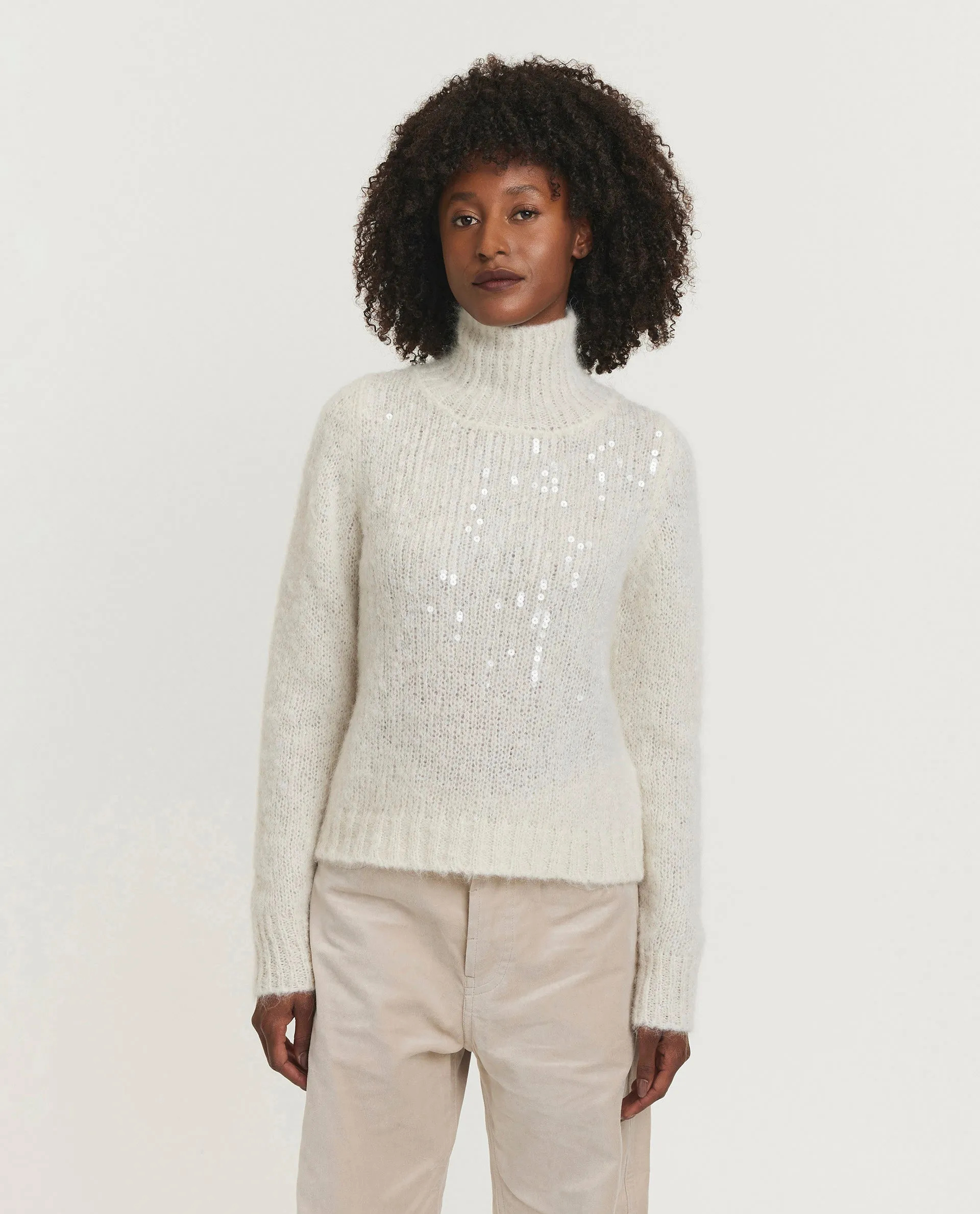 Gebreide coltrui sold by Pauw Amsterdam