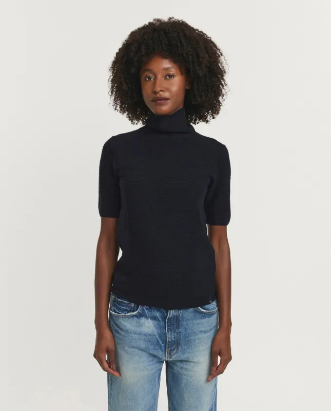 Wollen coltrui sold by Pauw Amsterdam