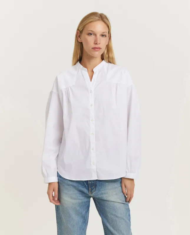 Witte blouse sold by Pauw Amsterdam