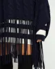 Gebreide poncho sold by Pauw Amsterdam