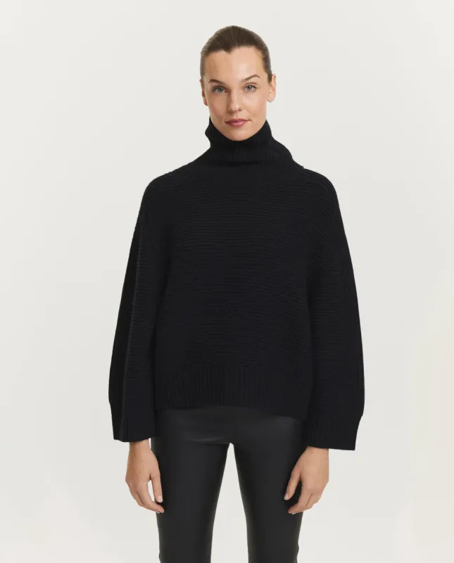 Gebreide coltrui sold by Pauw Amsterdam