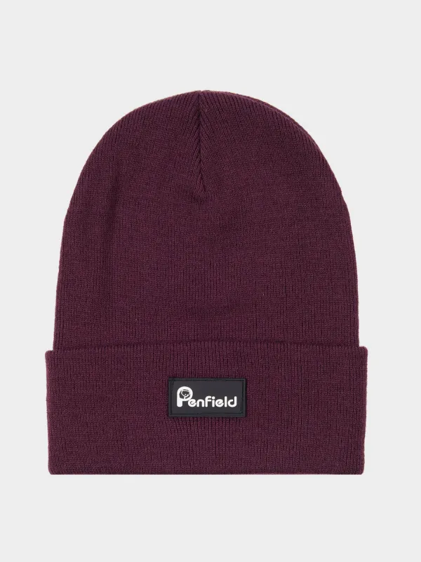 Reverse Badge Beanie in Winetasting sold by Penfield