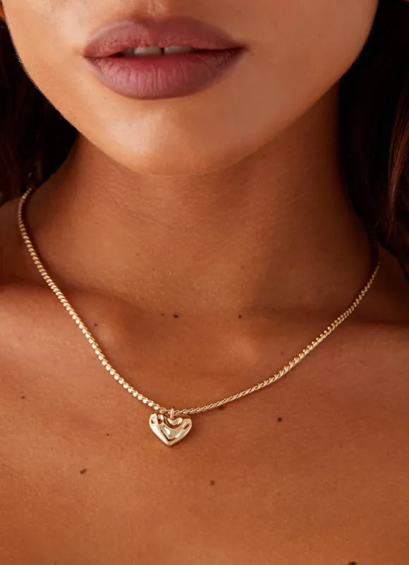Pending Heart Necklace - Gold sold by Peppermayo