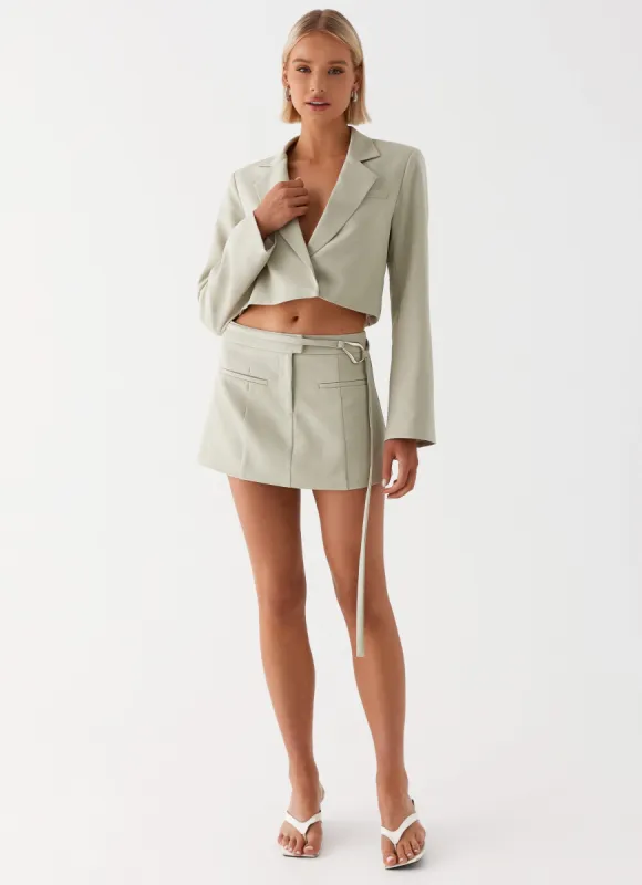 Renyold Mini Skirt - Sage sold by Peppermayo