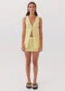 Capri Glow Knit Mini Skirt - Canary sold by Peppermayo
