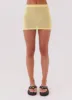Capri Glow Knit Mini Skirt - Canary sold by Peppermayo