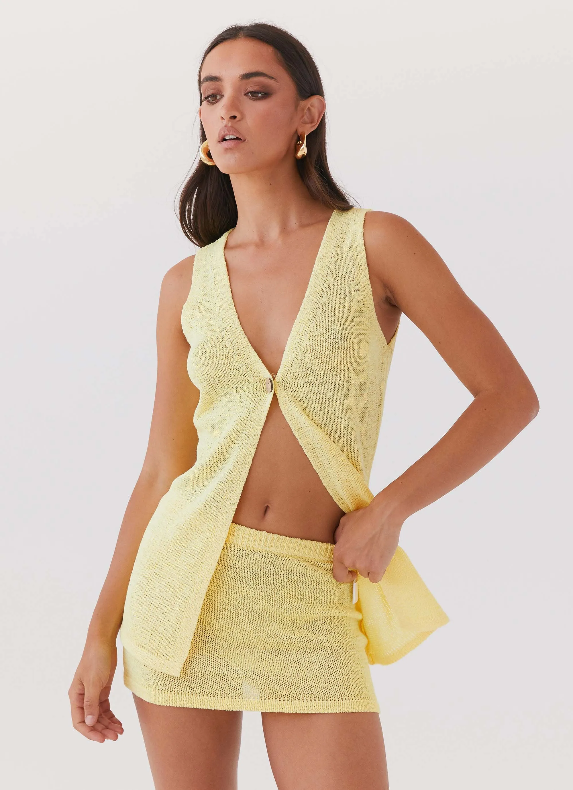 Capri Glow Knit Mini Skirt - Canary sold by Peppermayo
