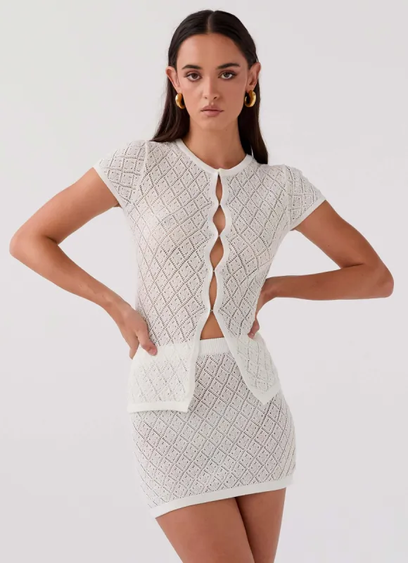 Prairie Petal Knit Mini Skirt - White sold by Peppermayo