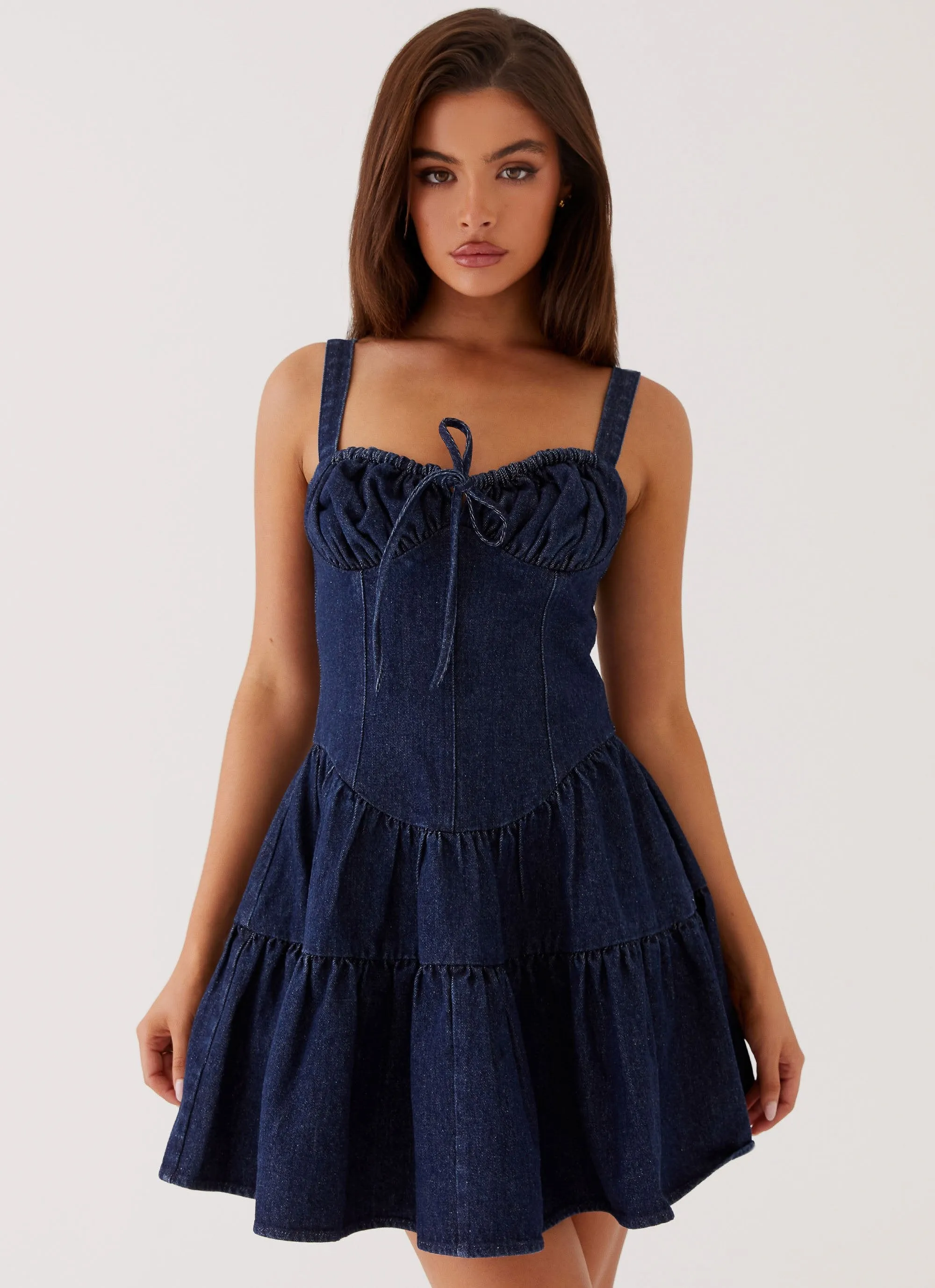 Lucie Denim Mini Dress - Indigo sold by Peppermayo