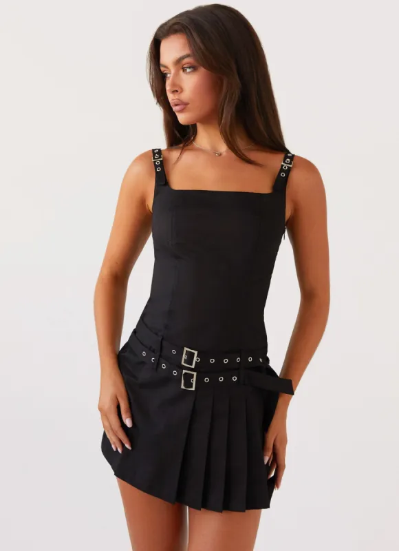 Lynette Buckle Mini Dress - Black sold by Peppermayo