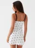 Masha Lace Mini Dress - Black Polka Dot sold by Peppermayo