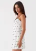 Masha Lace Mini Dress - Black Polka Dot sold by Peppermayo