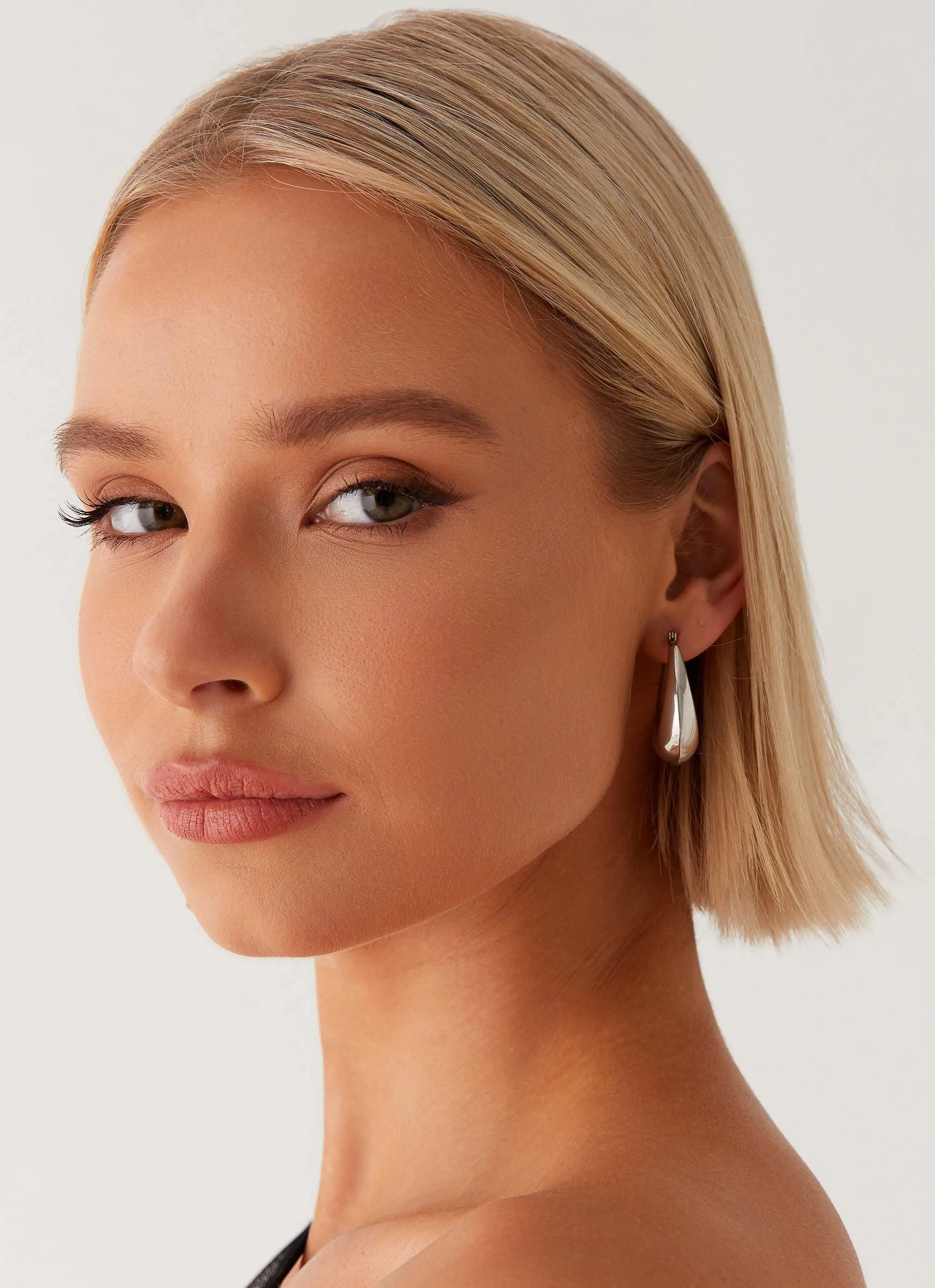 Slow Down Earrings - Silver sold by Peppermayo