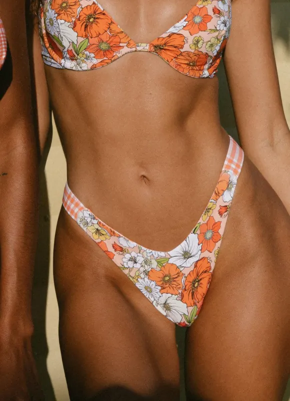 Reversible Jordan Bottom - 70s Floral / Sunburst Tartan sold by Peppermayo