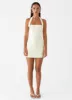 Bianca Halter Dress - Yellow sold by Peppermayo