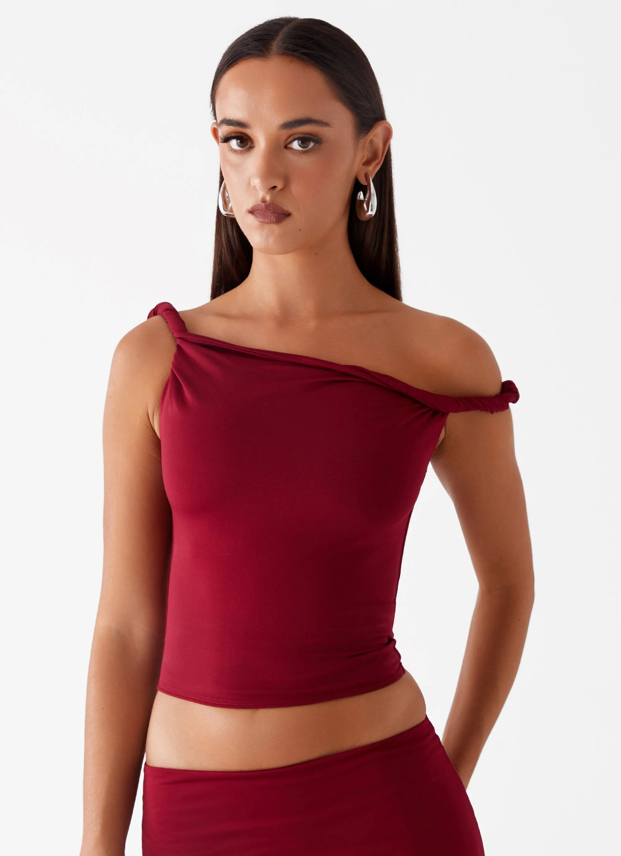 Solace Soul Twist Shoulder Top - Maroon sold by Peppermayo