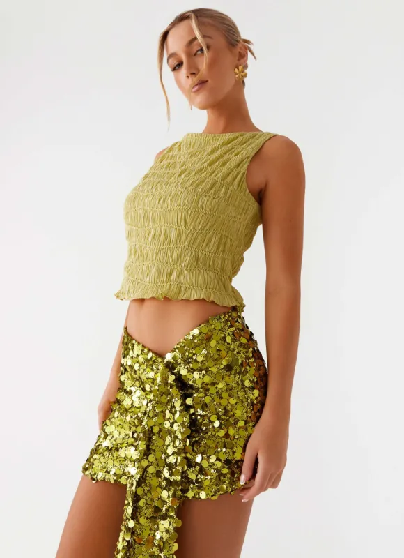 Lights On Sequin Mini Skirt - Olive sold by Peppermayo