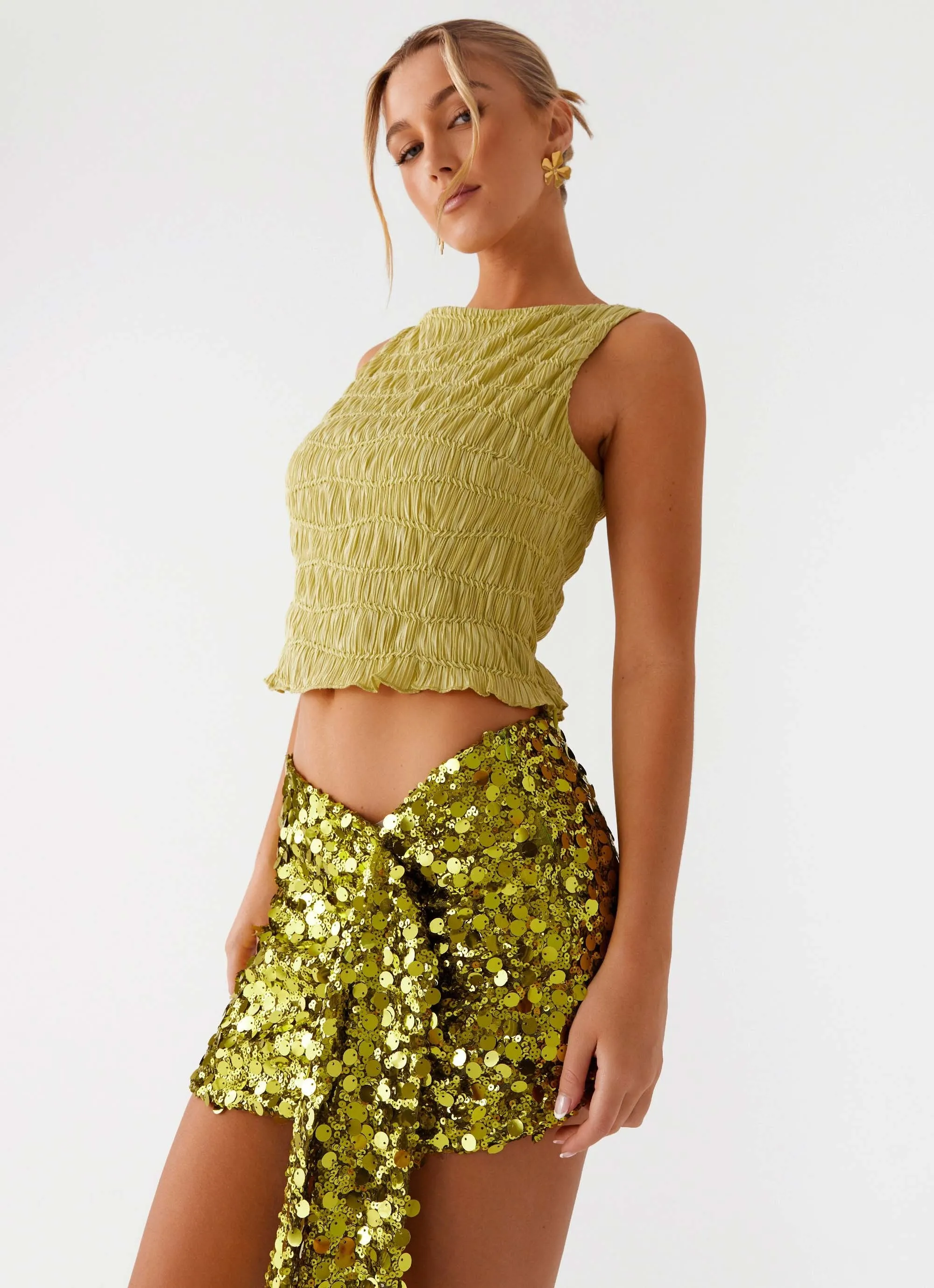 Lights On Sequin Mini Skirt - Olive sold by Peppermayo