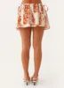 Athena Drawstring Mini Skirt - Orange Blue Floral sold by Peppermayo