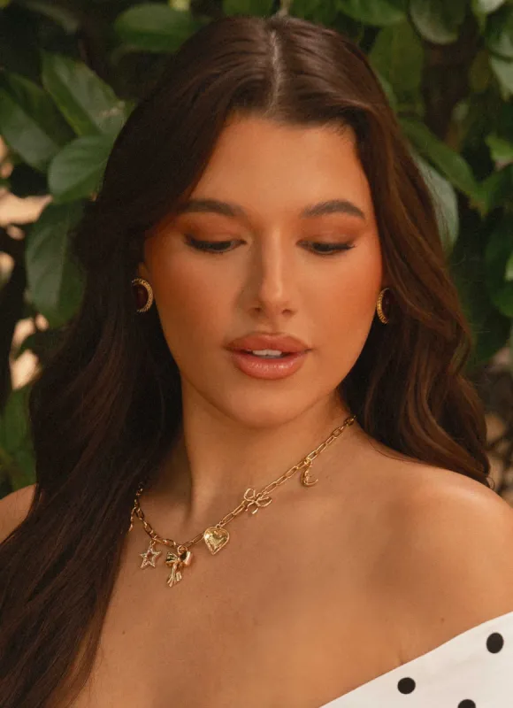 Celia Charm Necklace - Gold sold by Peppermayo