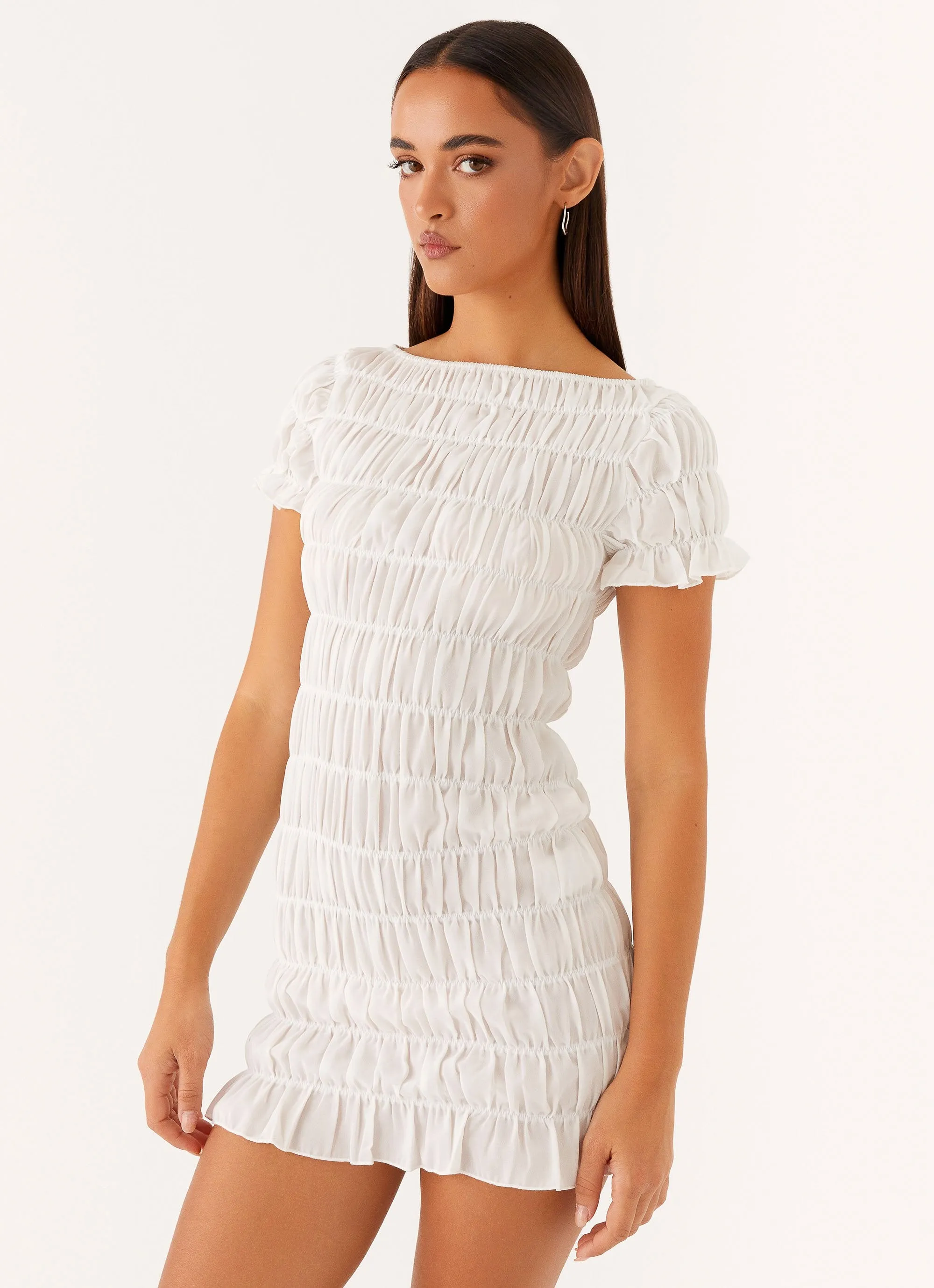 Rita Ruched Mini Dress - White sold by Peppermayo