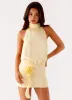 Birdie Halterneck Mini Dress - Yellow sold by Peppermayo