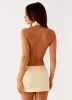 Birdie Halterneck Mini Dress - Yellow sold by Peppermayo