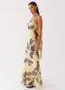 Under The Pagoda Maxi Dress - Buttercream Leaf Print sold by Peppermayo