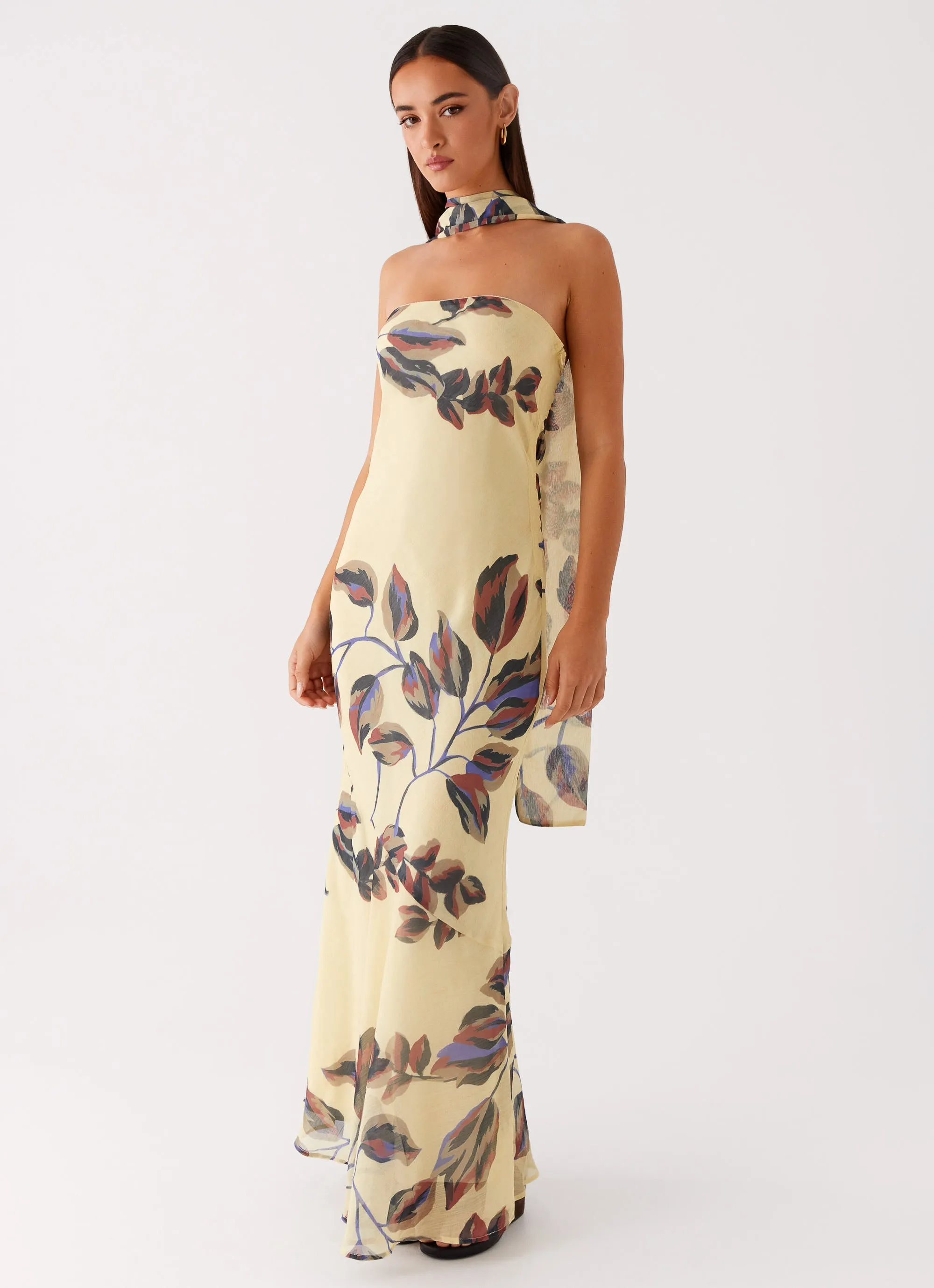 Under The Pagoda Maxi Dress - Buttercream Leaf Print sold by Peppermayo