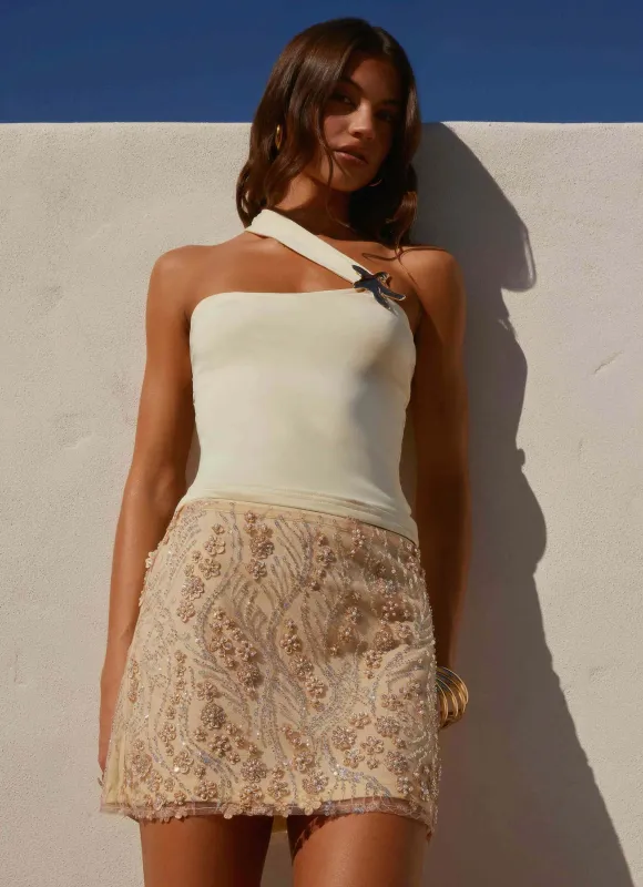 Kandi Mini Skirt - Yellow sold by Peppermayo